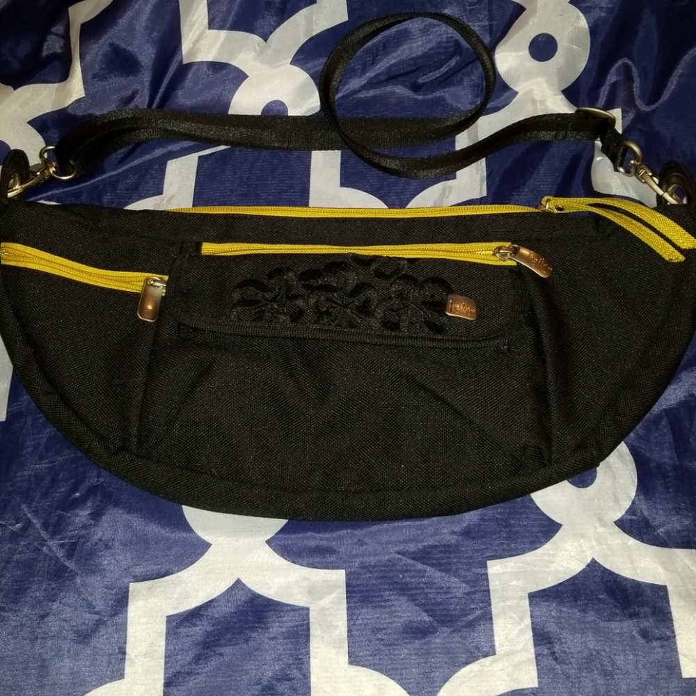 Haiku sling bag. Brushed silver hardware.